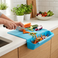 ChefCatch Schneidebrett in Aktion blau